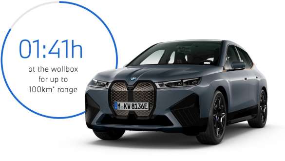 BMW iX M60 i20 2022 electric SUV BMW Individual Storm Bay metallic three-quarter front view with charging time graphic