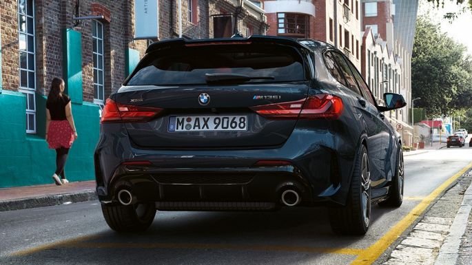 BMW M135i xDrive, rear view F40. BMW M135i xDrive in Black Sapphire metallic, rear view parking F40.