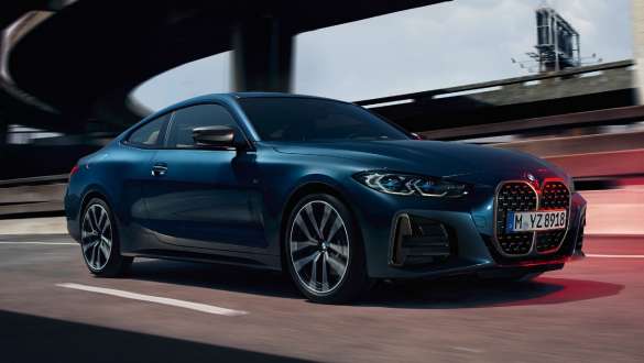M sport differential BMW M440i xDrive Coupé G22 2020 BMW M440i xDrive Coupé G22 2020 with M sport differential Arctic Race Blue metallic three-quarter side view