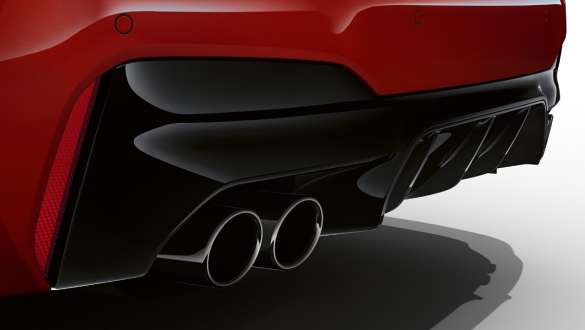 M rear apron in Black high-gloss BMW M5 Competition F90 2020 M rear apron in Black high-gloss BMW M5 Competition F90 LCI Facelift 2020 BMW Individual Imola Red close-up diffusor