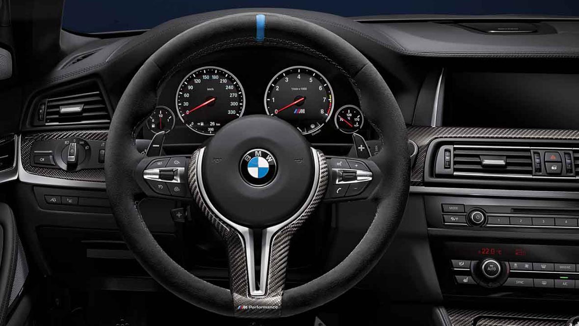 M Performance Alcantara steering wheel with carbon trim and race display