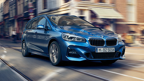 BMW 2 Series Gran Tourer F46 three-quarter front view driving on the street BMW 2 Series BMW 2 Series Gran Tourer F46 three-quarter front view driving on the street