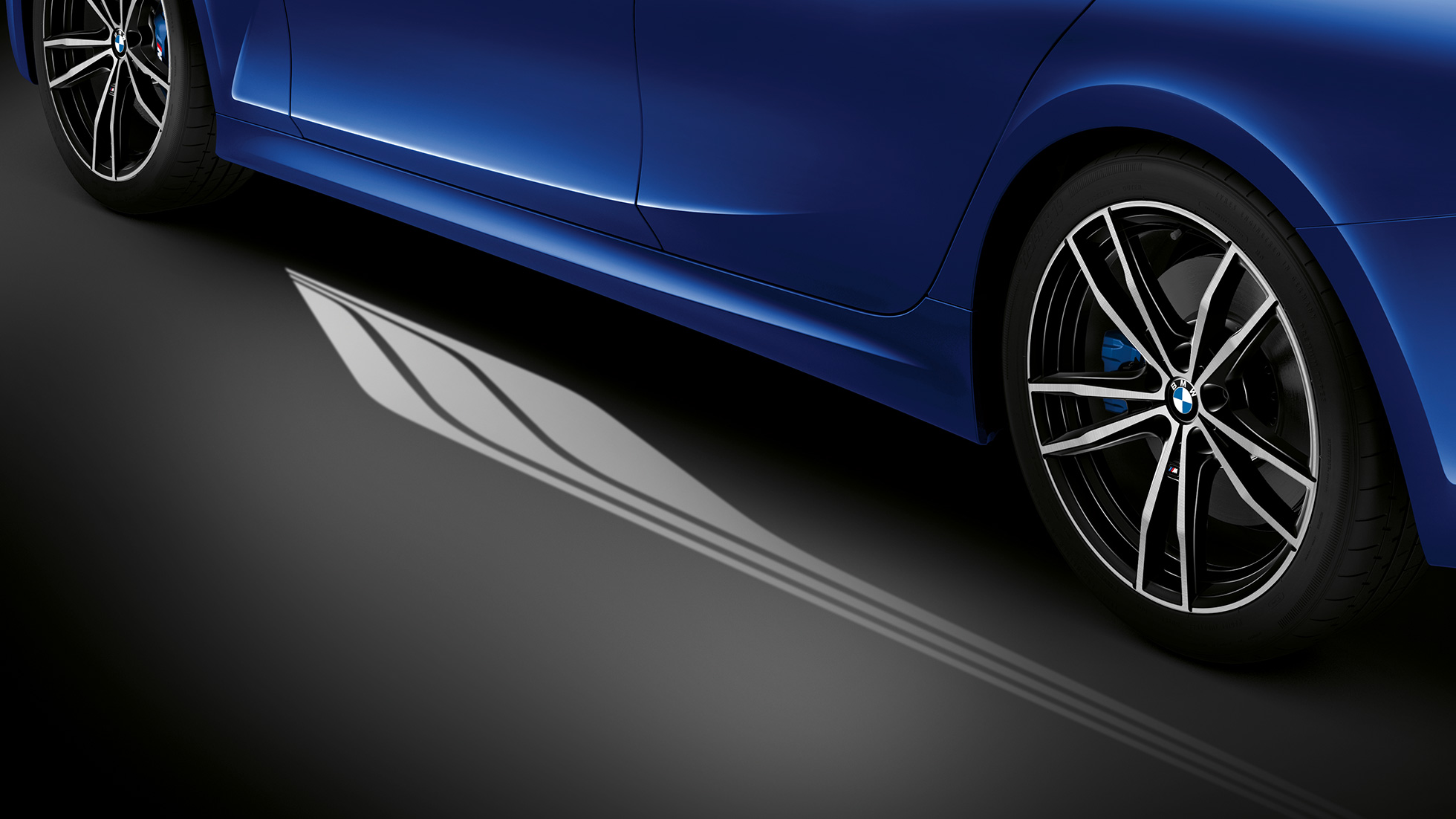 BMW 3 Series, Welcome Light Carpet G20 Detailed side view of the open driver's door with Welcome Light Carpet G20.