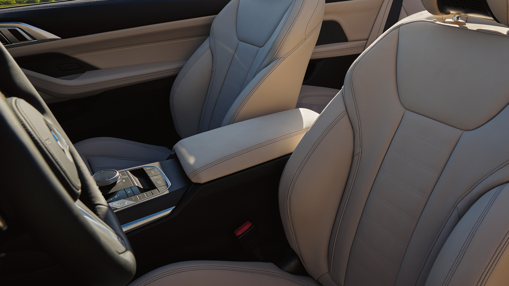 Centre console and seats of the BMW 4 Series Convertible G23 BMW 4 Series Convertible G23 2020 Sanremo Green metallic interior centre console and seats