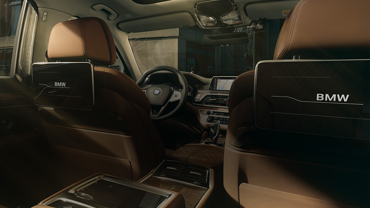 BMW 7 Series Sedan G11 Rear-seat Entertainment BMW 7 Series Sedan G11: view from behind to the Rear-seat Entertainment with HD Touch Screens