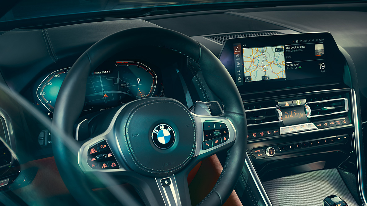 BMW 8 Series Coupé, cockpit G15. Close-up of the BMW 8 Series Coupé interior with a focus on the steering wheel G15.