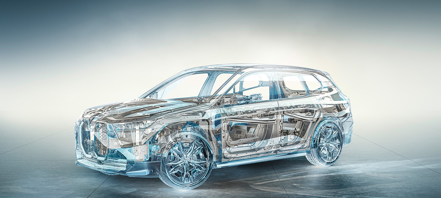 BMW iX M60 i20 2022 electric SUV driving on coastal road BMW iX M60 i20 2022 electric SUV BMW Individual Storm Bay metallic rear view driving on coastal road