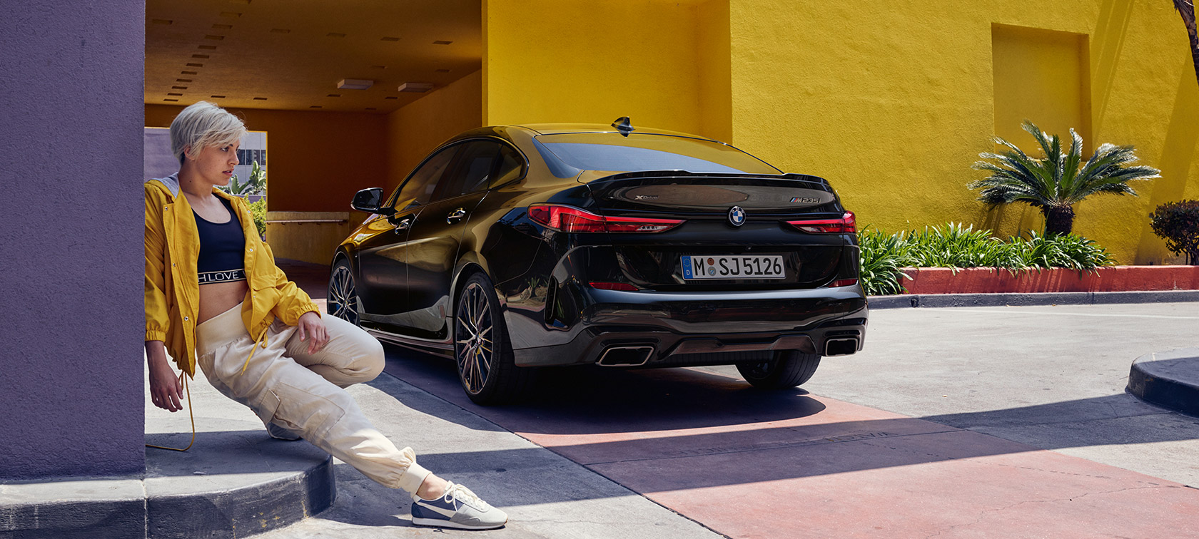BMW M235i xDrive Gran Coupé three-quarter rear view F44 BMW M235i xDrive Gran Coupé Black Sapphire metallic F44 three-quarter rear view