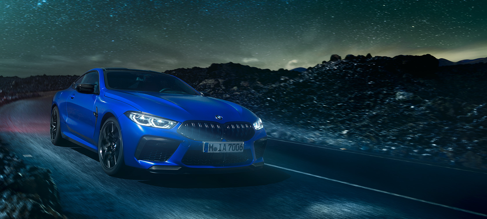 The BMW M8 Competition Coupé F92. The first-ever BMW M8 Competition Coupé in Marina Bay Blue metallic, three-quarter front view F92.