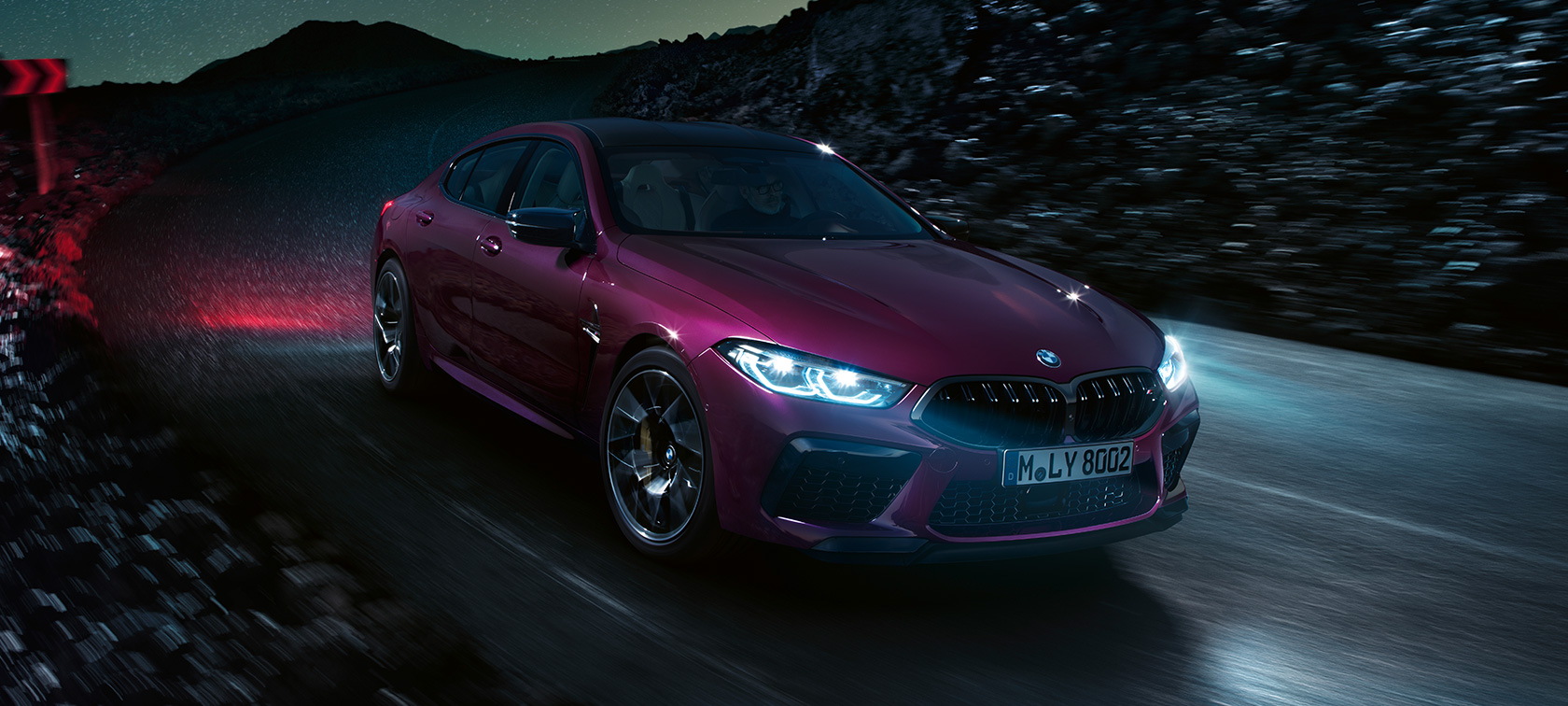 BMW M8 Competition Gran Coupé three-quarter front view F93 BMW M8 Competition Gran Coupé F93 2020 BMW Individual Ametrine metallic driving at night three-quarter front view