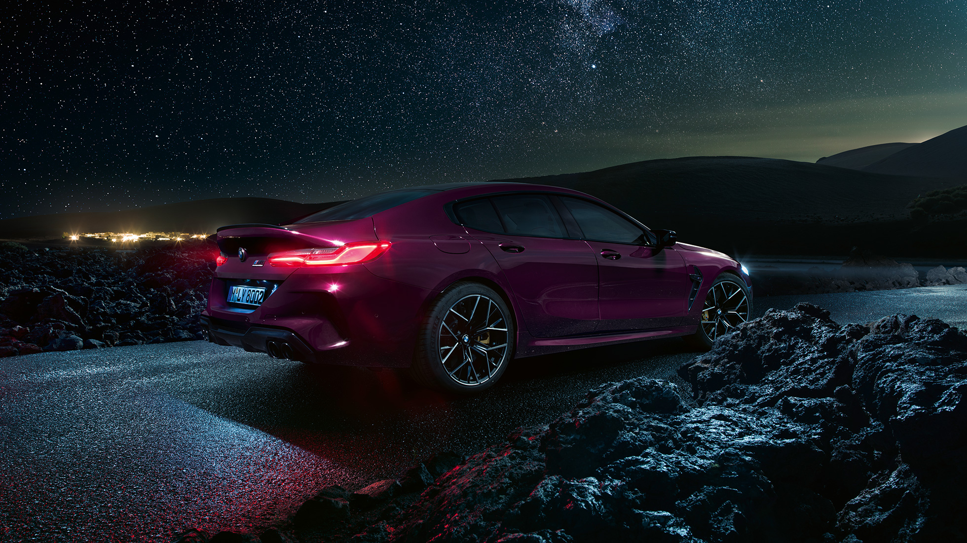 BMW M8 Competition Gran Coupé F93 2020 three-quarter side view from rear BMW M8 Competition Gran Coupé F93 2020 BMW Individual Ametrine metallic three-quarter side view from rear