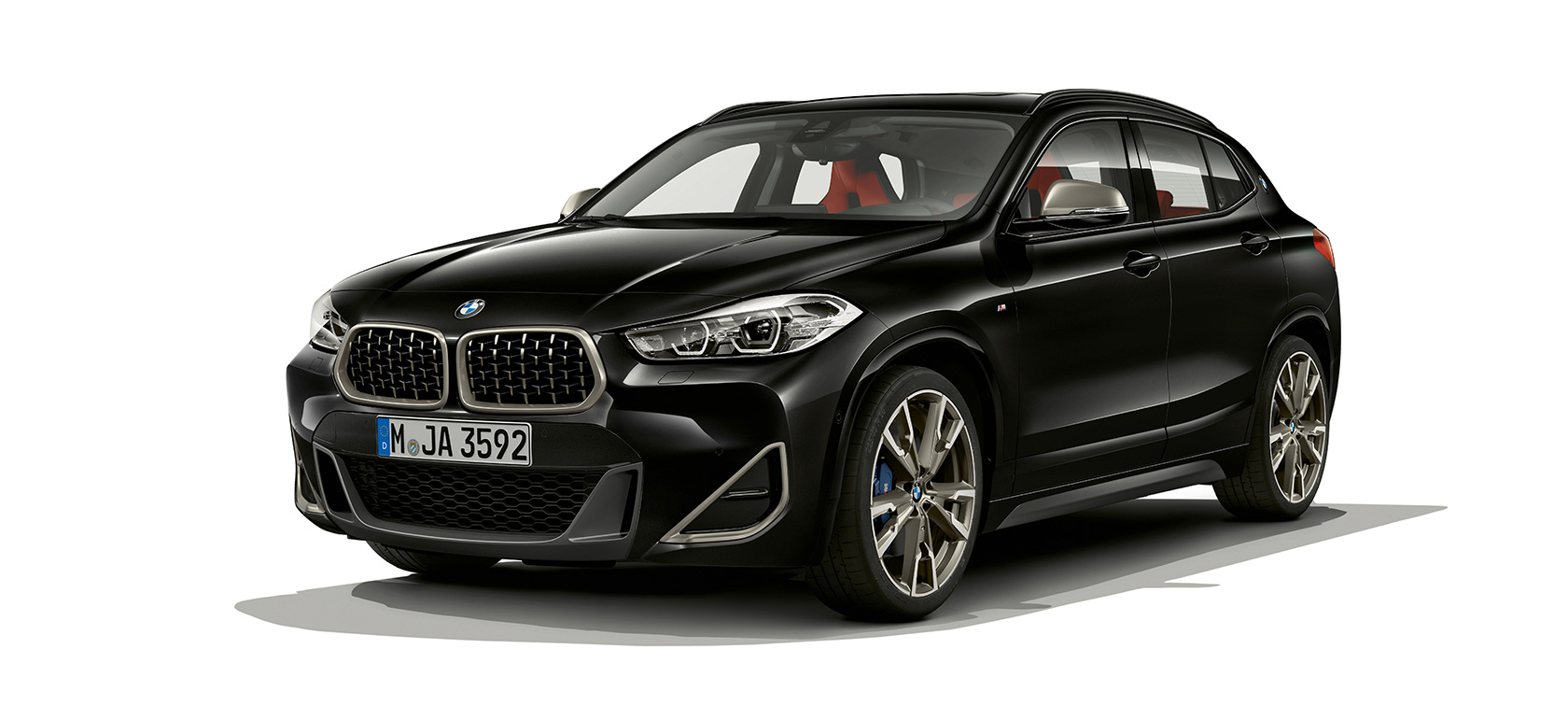Three-quarter front view BMW X2 M35i SUV F39 Three-quarter front view BMW X2 M35i SUV 2018 F39 Sapphire Black metallic