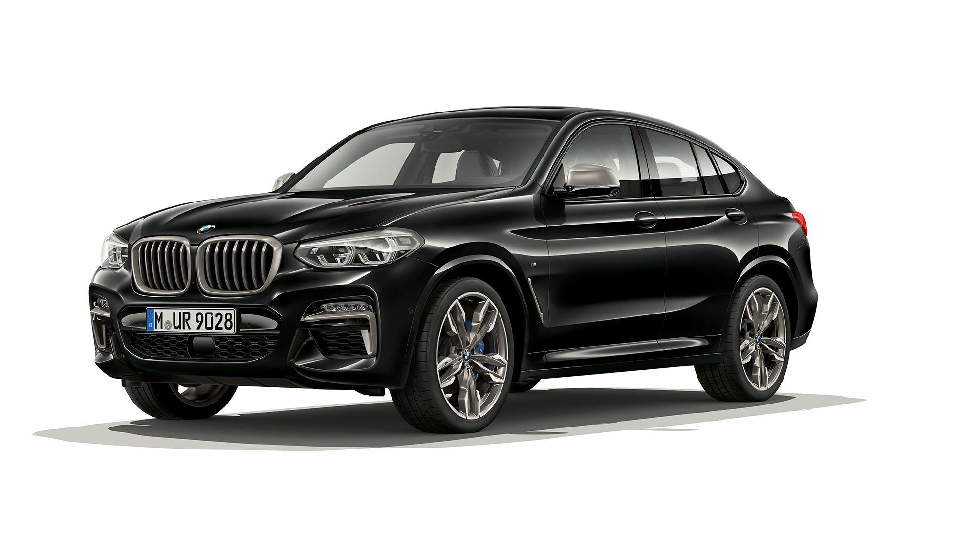 BMW X4 M40i SUV three-quarter front view F98. BMW X4 M40i SUV in Black Sapphire metallic, exterior, three-quarter front view, right side F98.