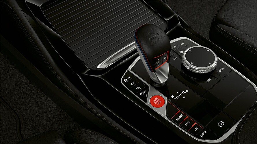 BMW X4 M Competition F98 LCI 2021 gear selector switch BMW X4 M Competition F98 LCI Facelift 2021 centre console close-up gear selector switch