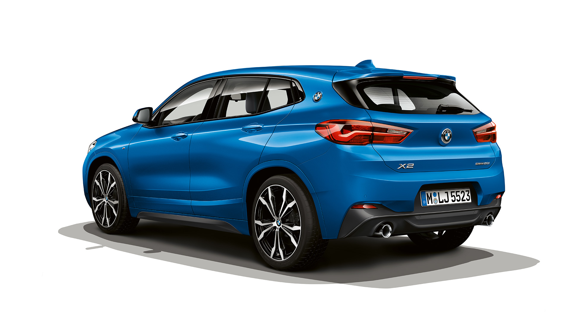 Three quarter side view BMW X2 SUV sDrive20i model M Sport F39 BMW X2 SUV sDrive20i model M Sport 2018 F39 Misano Blue metallic three quarter side view