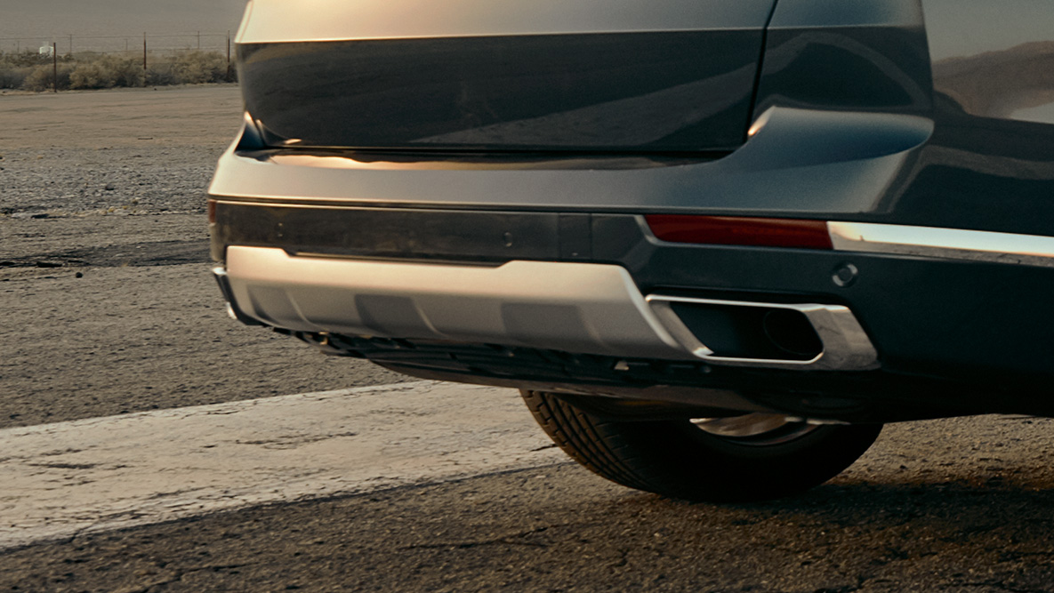 M sports exhaust system SUV G07 Close-up of the BMW X7 SUV rear with focus on M sports exhaust system G07