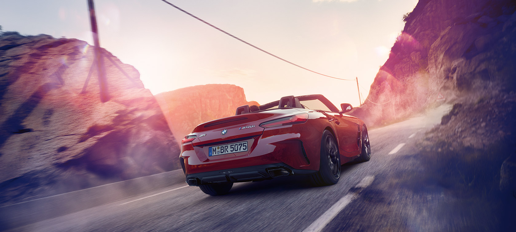 BMW Z4 Roadster G29 driving through mountains BMW Z4 Roadster G29 driving through mountains