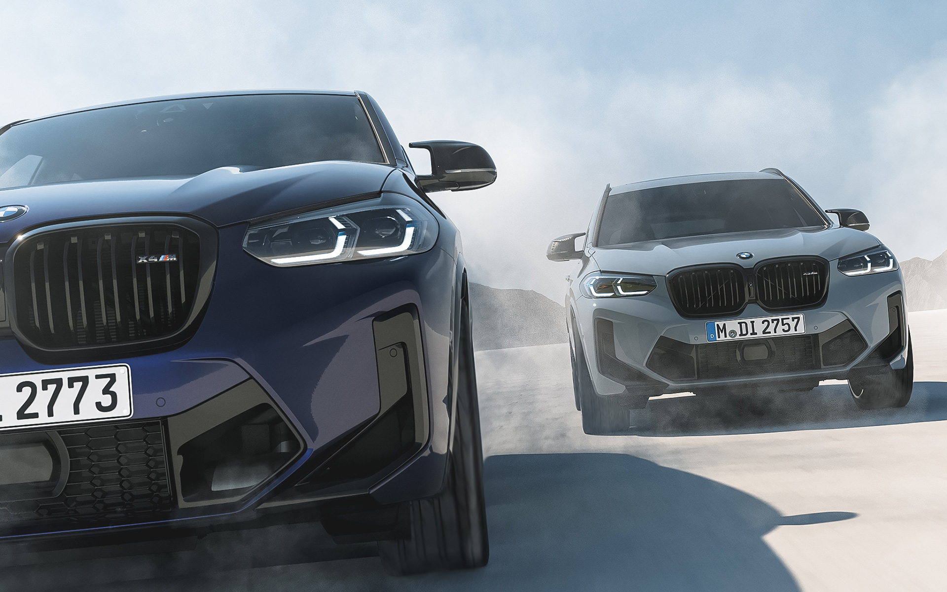 BMW X4 M F98 in BMW Individual Velvet Blue, BMW X3 M F97 in BMW Individual Nardogrey BMW X4 M F98 in BMW Individual Velvet Blue, BMW X3 M F97 in BMW Individual Nardogrey, front view, driving