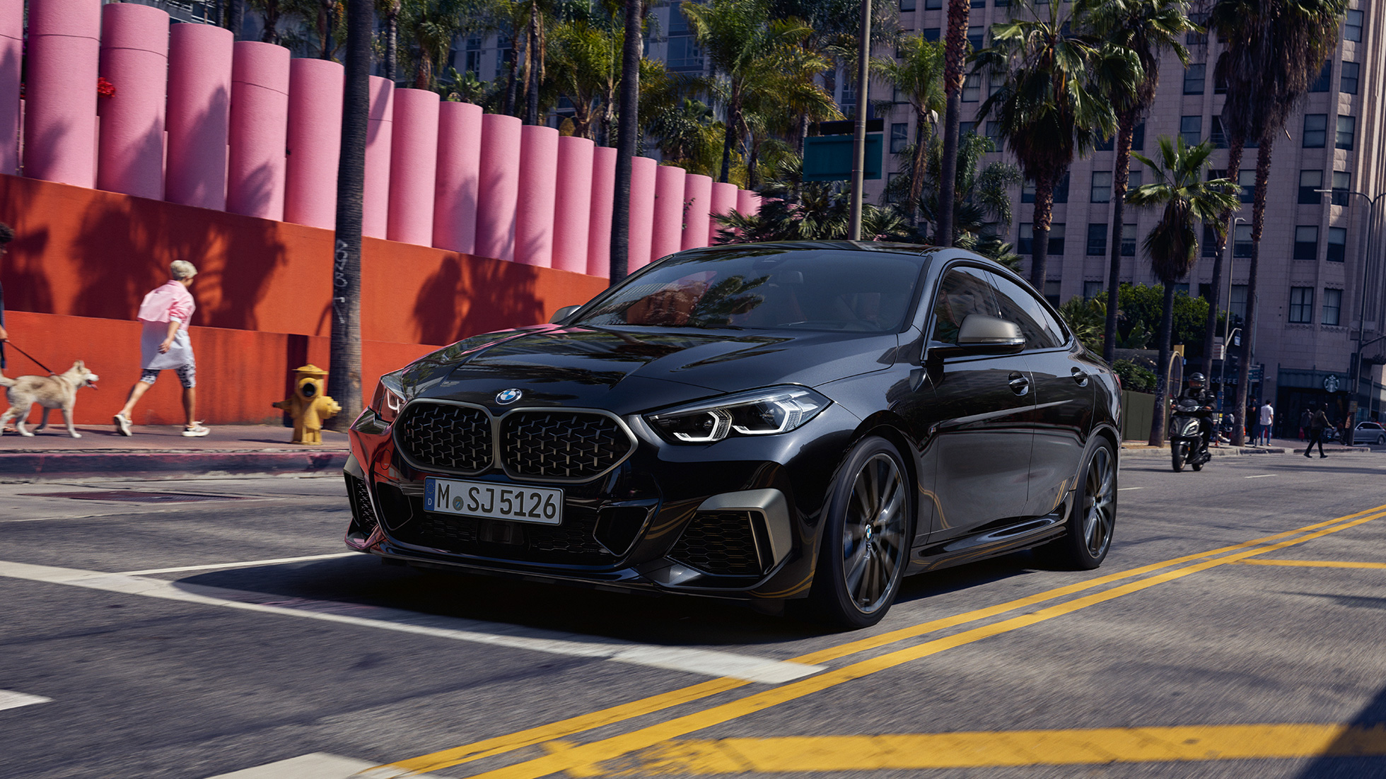 BMW M235i xDrive Gran Coupé F44 three-quarter front view standing BMW M235i xDrive Gran Coupé 2020 Black Sapphire metallic F44 three-quarter front view standing