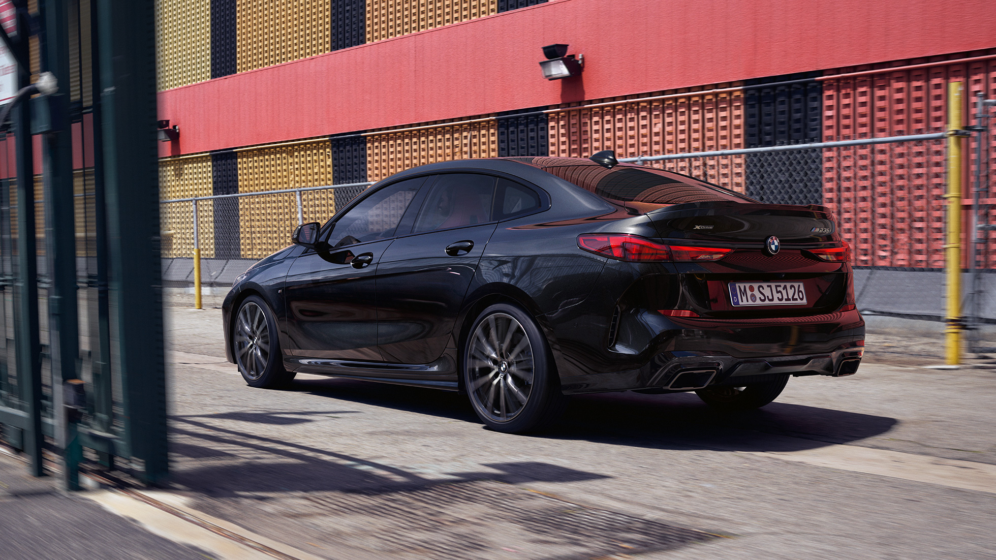 BMW M235i xDrive Gran Coupé F44 three-quarter rear view standing BMW M235i xDrive Gran Coupé 2020 Black Sapphire metallic F44 three-quarter rear view standing