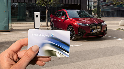 Connected Charging BMW Charging Card with BMW iX Connected Charging BMW Charging Card with BMW iX in the background