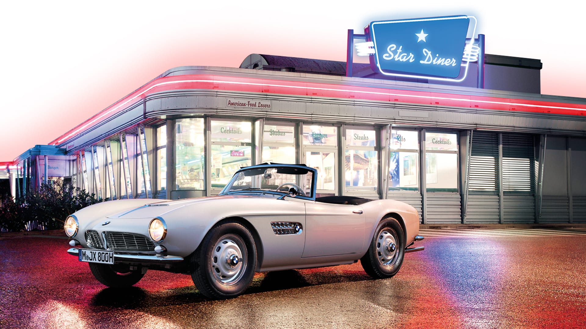 Restored Elvis BMW 507 in front of a diner