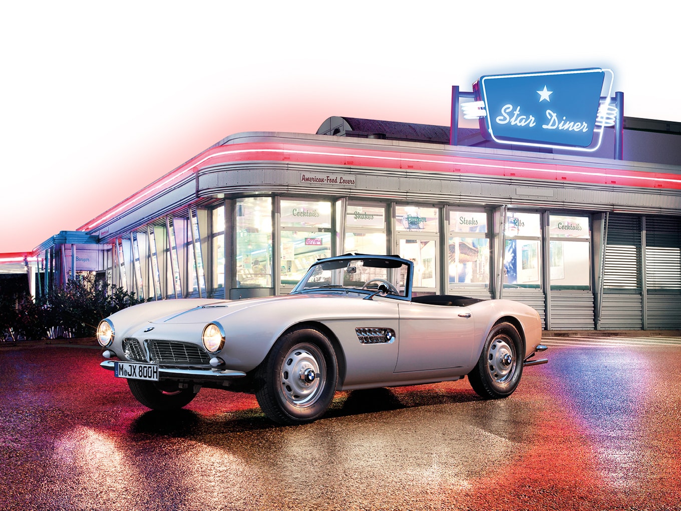 Restored Elvis BMW 507 in front of a diner